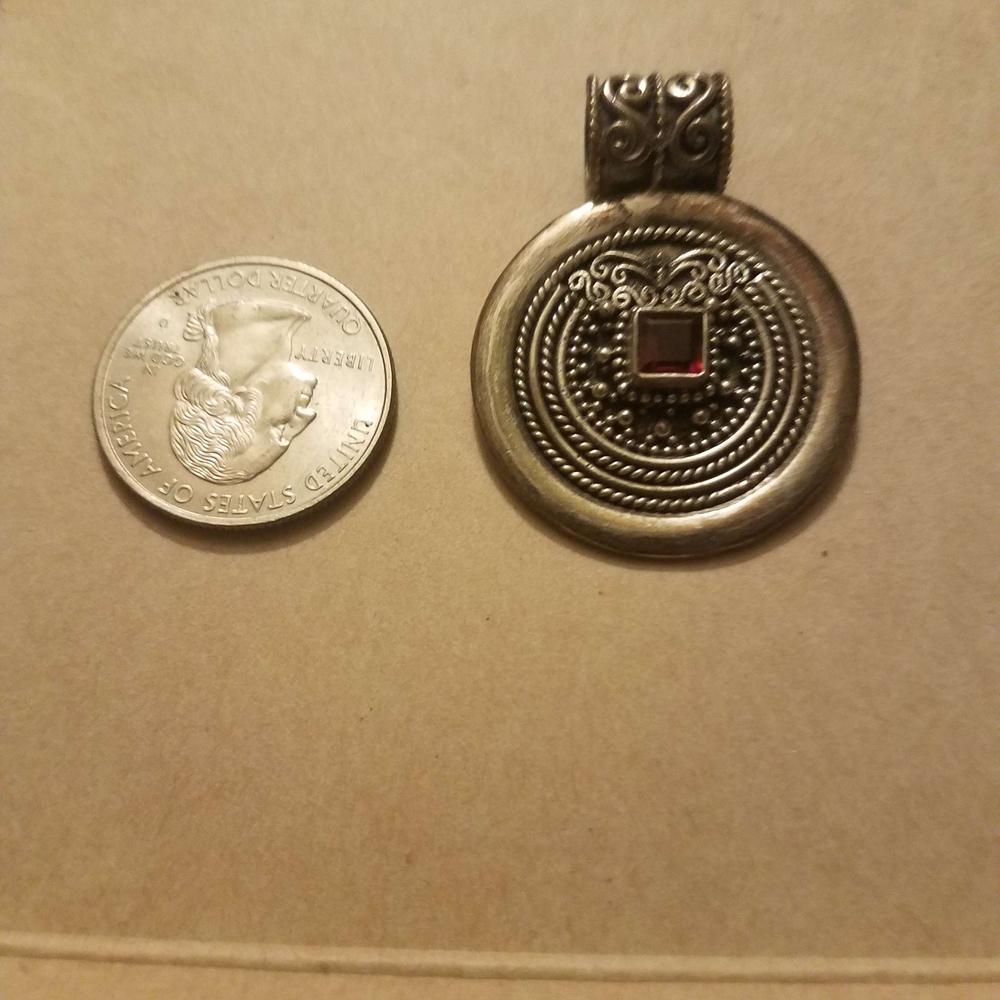 Intricate Sterling Silver and Garnet Pendant